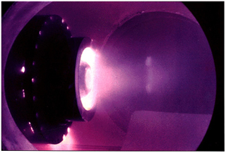 A Magneto Plasma Dynamic thruster test firing.