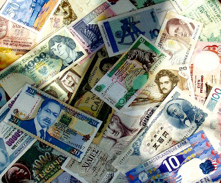 Photograph of paper currency from several countries.