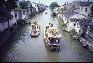 Photo of boats on a canal in Suzhou, China.